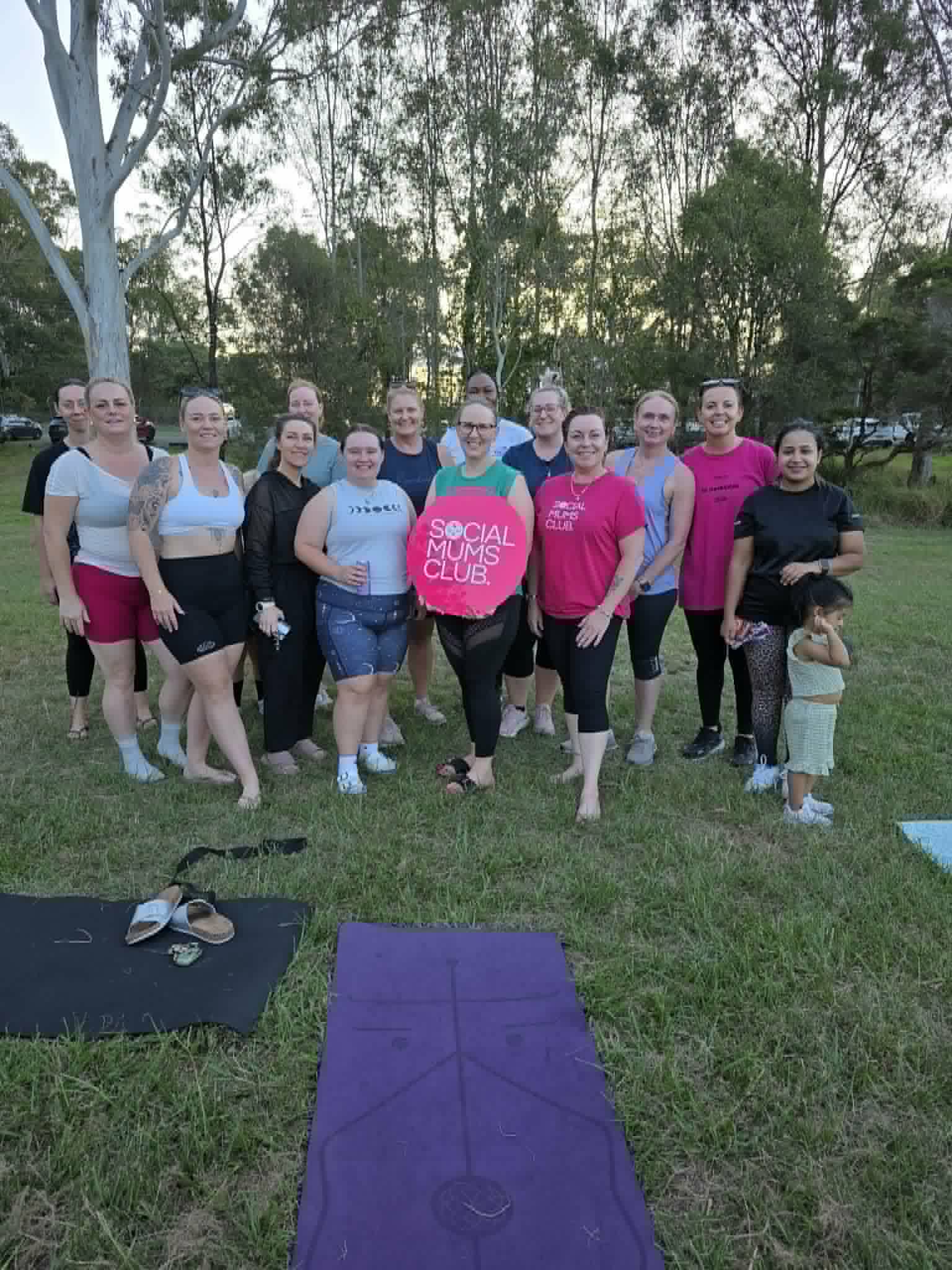 Mums doing yoga together at a Social Mums Club event
